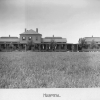 <p>The second hospital at Fort Slocum. The wood-frame building was built in 1878 and demolished around 1904, view north, ca. 1893. The 20th-century brick hospital (Building 46) would later be built just behind the site of this building.</p>
